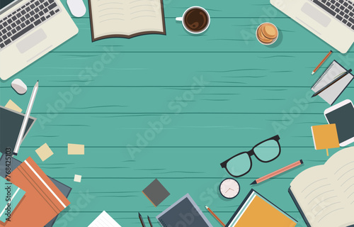 Office Supplies on Work Table with Copy Space on Green Wooden Background