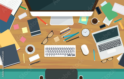 Messy Work Desk with Computer Book Pen Scattered on the Table