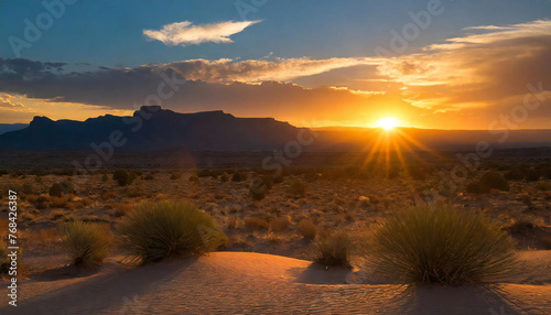 夕暮れの砂漠。広大な砂漠地帯の夕焼け。Desert at dusk. Sunset over a vast desert area.