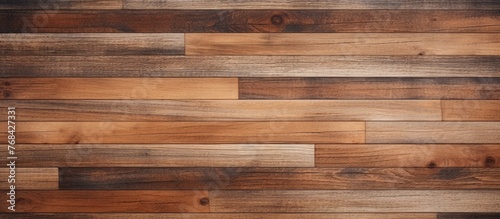 A detailed shot of a brown hardwood plank wall with a blurred background showcasing the intricate pattern and texture of the building material