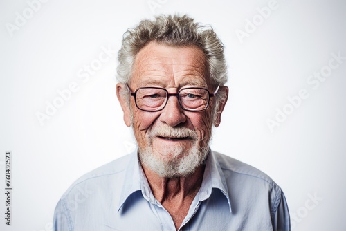 Portrait of a senior man in glasses. Isolated on white background.