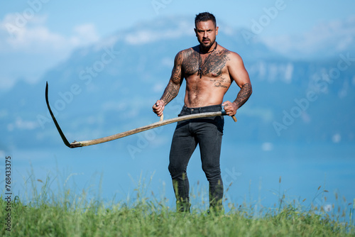 Sexy farmer. Seductive face of a sexy guy. Handsome shirtless man in nature. Muscular male fit body. Strong athletic man. Fit male model. Healthy handsome Athletic Man outdoor.