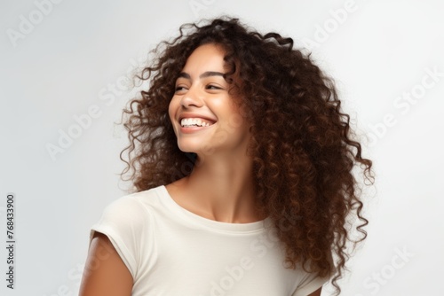 Portrait of beautiful young african american woman with curly hair