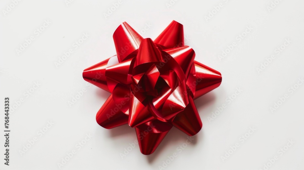 Red gift bow on white background. Gift wrapping ribbon Red gift bow on white background. Gift wrapping ribbon