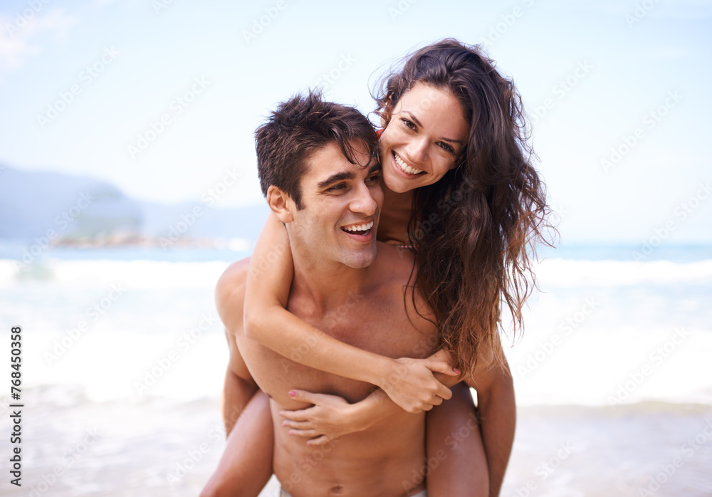 Piggyback, beach and portrait of couple on vacation, adventure or holiday for romantic travel. Happy, love and young man and woman on date by ocean for tropical outdoor anniversary weekend trip. Piggyback, beach and portrait of couple on vacation, adventure or holiday for romantic travel. Happy, love and young man and woman on date by ocean for tropical outdoor anniversary weekend trip.