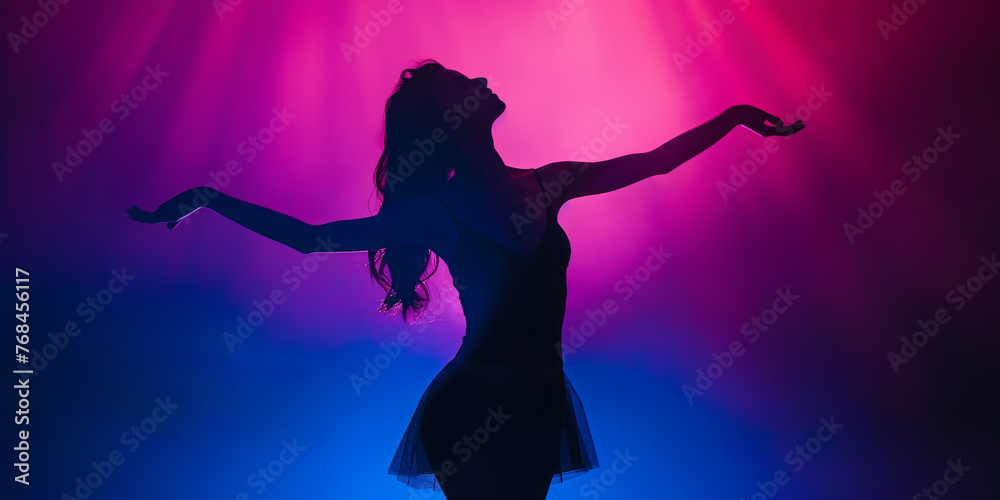 A woman is dancing in a purple background