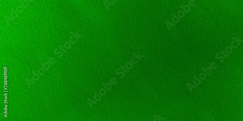 Green texture. Denim pattern green fabric texture close up.	