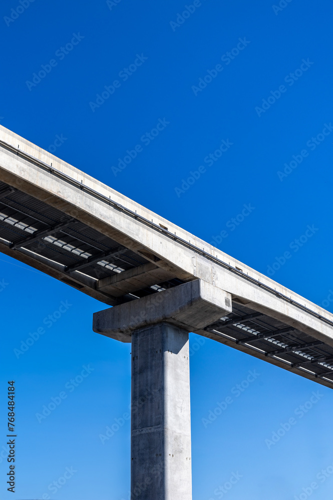 Conrete architecture detail on blue sky background Conrete architecture detail on blue sky background