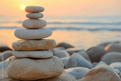 Stack of zen stones on the beach at sunset   Zen concept