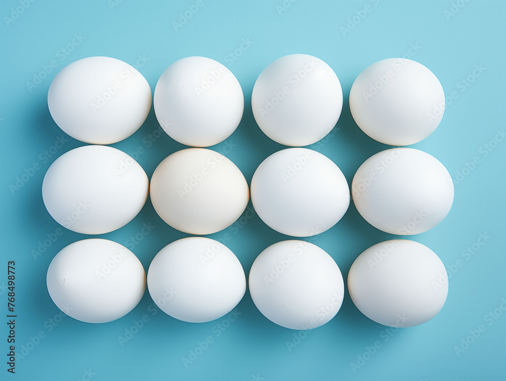 Pile of White Eggs Isolated on Blue Background. Generative AI Pile of White Eggs Isolated on Blue Background. Generative AI