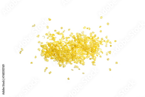 Millet flakes isolated on white bacground.
