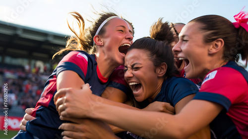 Exuberant Women's Soccer Team Celebrating Victory with a Group Hug, Energetic Embrace on the Field, Expression of Team Spirit and Success, Dynamic Sports Moment Captured