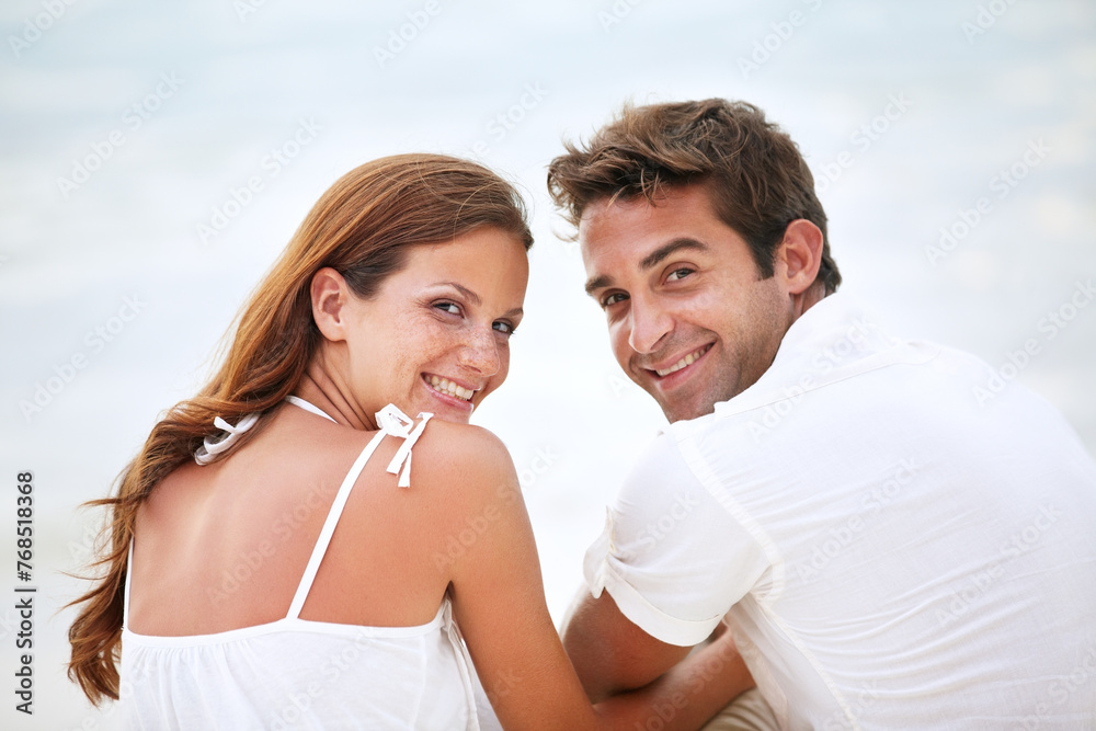 Fototapeta premium Happy couple, portrait and love in nature for romantic and travel on honeymoon by sky background. Man, woman and smile on face for bonding together with care, peace or trip for commitment in marriage