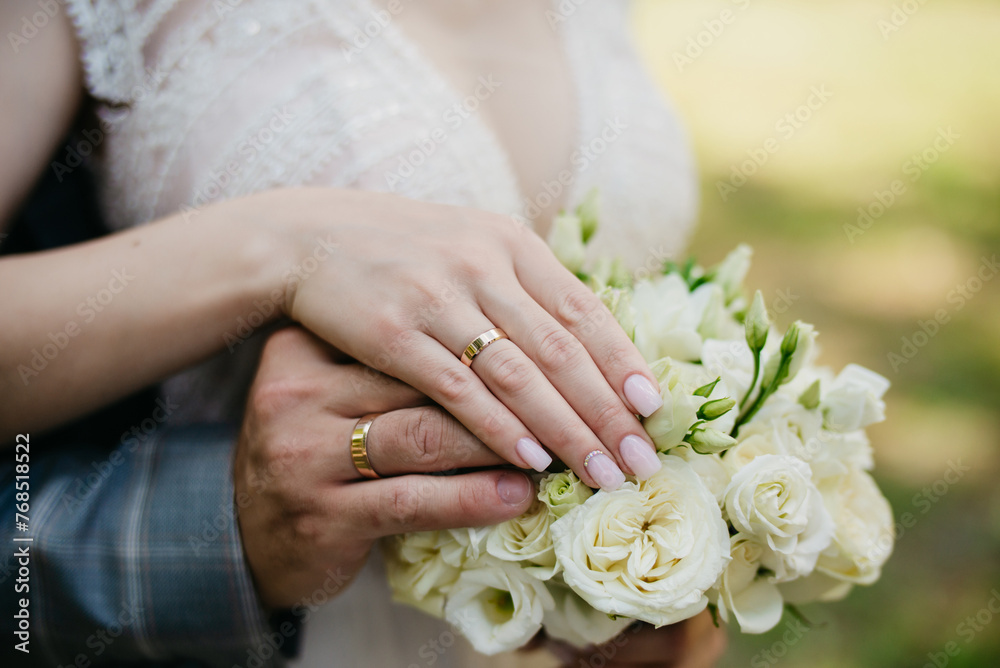 Hand in hand. Certification and marriage proposal. Gentle manicure on beautiful hands