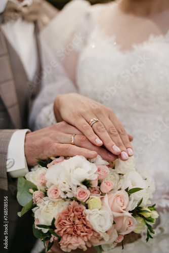 Hand in hand. Certification and marriage proposal. Gentle manicure on beautiful hands