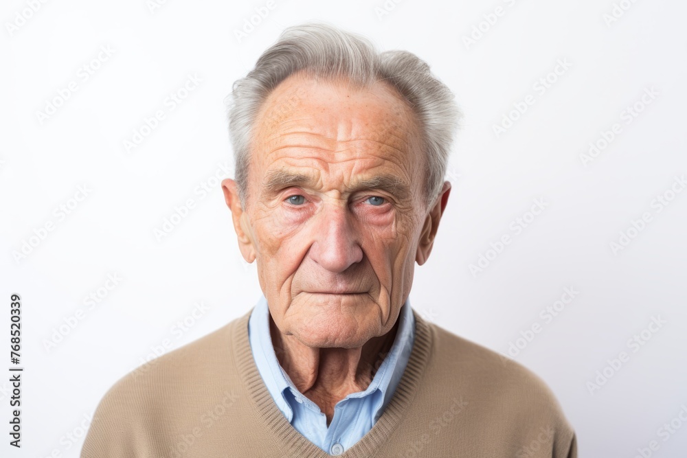 Portrait of an old man with grey hair on a white background Portrait of an old man with grey hair on a white background