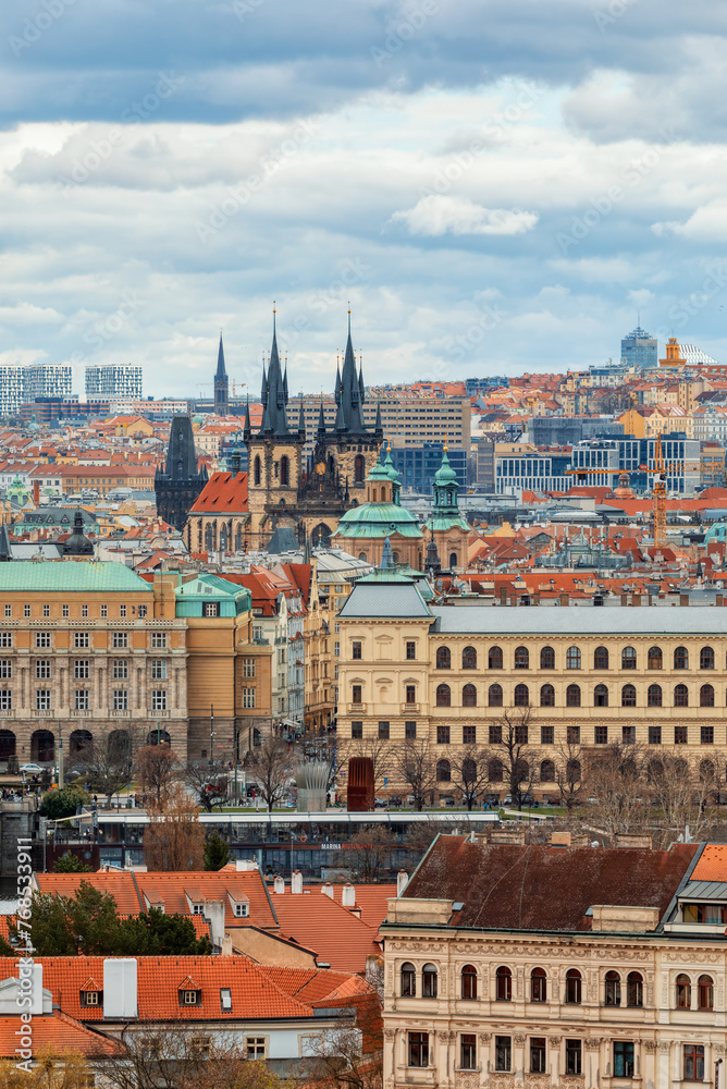 Obraz premium Panorama of old historic town Prague in Czech Praha, view from castle hill to old town square in sunny day, Central Bohemia, Czech Republic