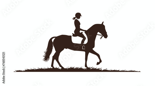 Silhouette of athlete riding a horse. The horse stands photo