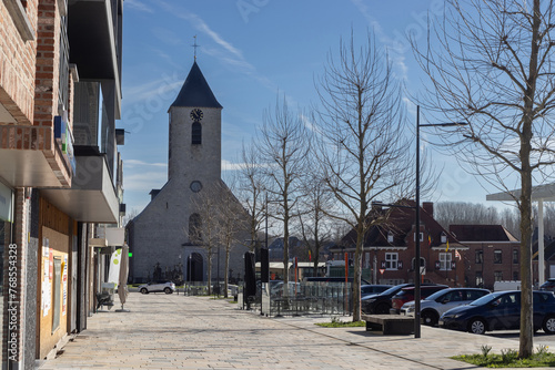 The town center and St. Micheals church in Sint-Lievens-Houtem in East Flanders, Belgium. Copy space above right.