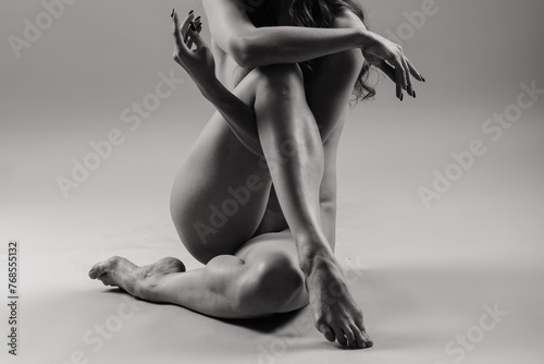 Female nude silhouette, young seductive woman with naked body