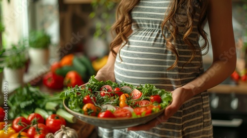 Pregnant woman preparing food 
