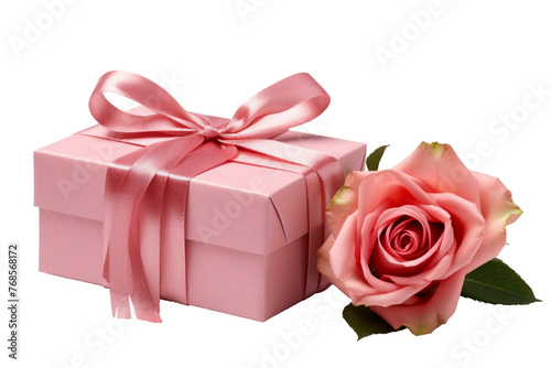 Pink rose with gift box on white background © PhotoFolio Finds