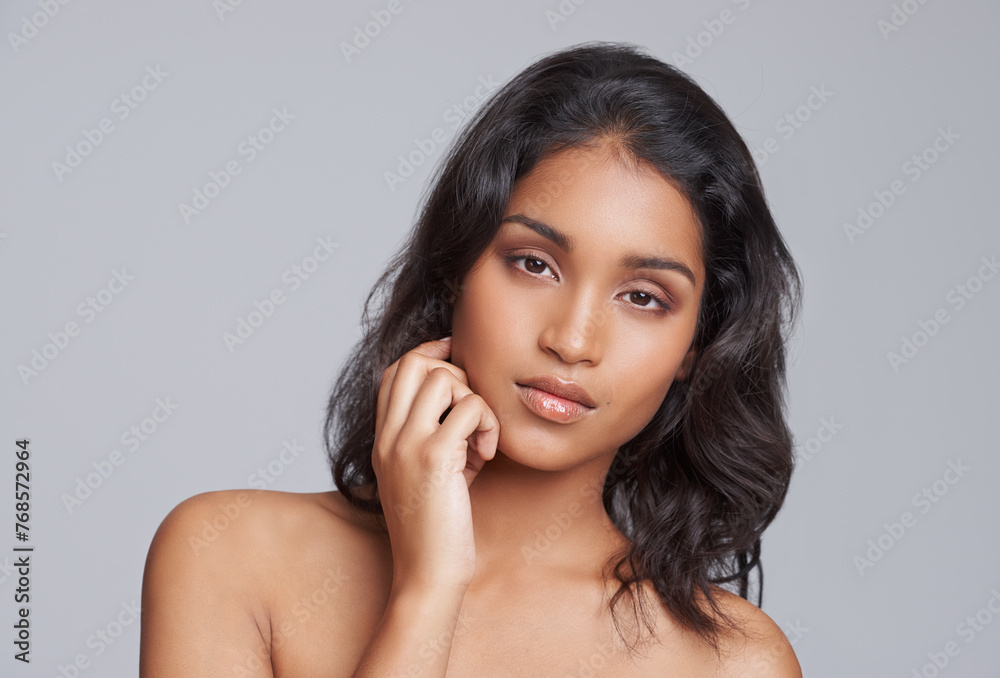 Natural, beauty and portrait of woman in studio with health, wellness and skincare facial routine. Model, cosmetics and face of female person with dermatology treatment isolated by gray background. Natural, beauty and portrait of woman in studio with health, wellness and skincare facial routine. Model, cosmetics and face of female person with dermatology treatment isolated by gray background.
