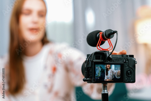 Woman influencer shoot live streaming vlog video review makeup utmost social media or blog. Happy young girl with cosmetics studio lighting for marketing recording session broadcasting online.