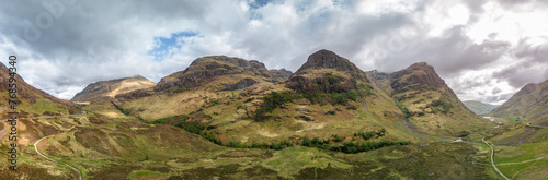 The vastness of the Glen Coe valley is on full display in this drone captured super panorama, with the Three Sisters towering above, their slopes a tapestry of Scottish wilderness