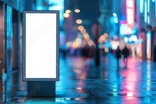 Blank city format (LightPoster, CityLight) banner pylon on the sidewalk mockup. Billboard in the city center mock up. Blurred background, focus on foreground, copy space.