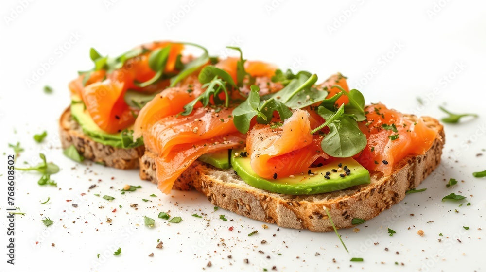 sandwich with avocado, lettuce and salmon on white background. sandwich with avocado, lettuce and salmon on white background.