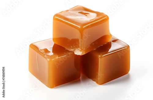 Cubes of caramel isolated on white background