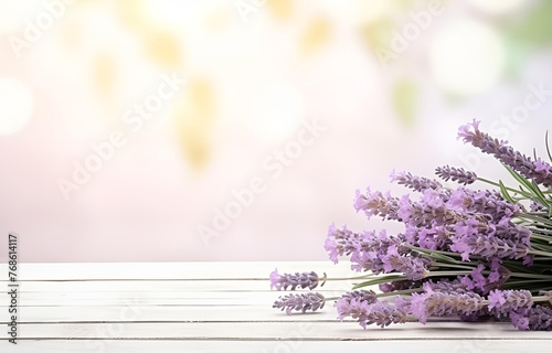 fresh lavender flowers and herbs on white wooden table backgroun