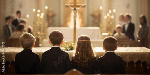 Gathering of boys and girls in elegant attire positioned around the church altar with candles and a crucifix. Back shot attending a religious service or ceremony. First communion concept.
