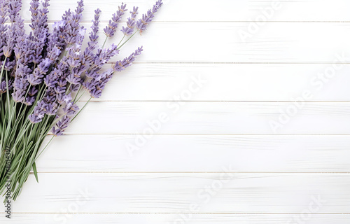 fresh lavender flowers and herbs on white wooden table backgroun