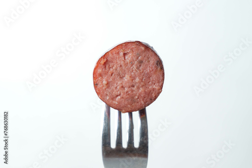 Εκτύπωση καμβά sliced smoke beef sausage on a fork isolated on white background