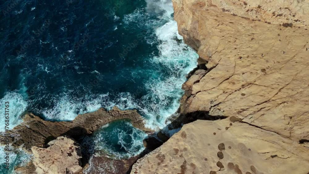 Blue Hole at Azure Window. Gozo, Malta island seaside coast Mediterranean Sea. Slow motion aerial Blue Hole at Azure Window. Gozo, Malta island seaside coast Mediterranean Sea. Slow motion aerial