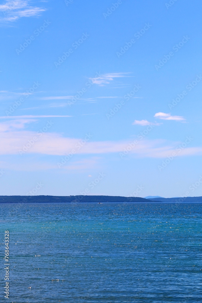 Bright blue sea and clear sky. Copy space. Bright blue sea and clear sky. Copy space.