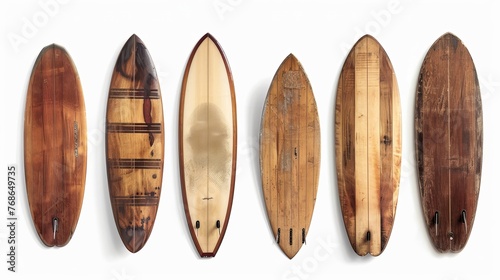 Vintage wooden surfboards in different styles, isolated on white background. Clipping path included for easy editing. photo