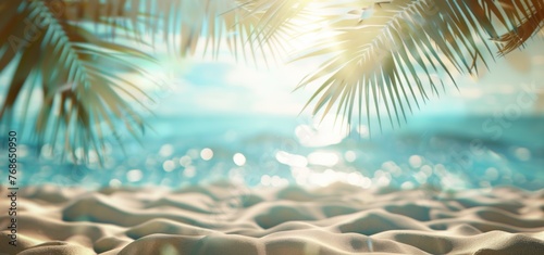 Beautiful blurred background of a sandy tropical beach and sea with palm leaves on a sunny summer day © wanna