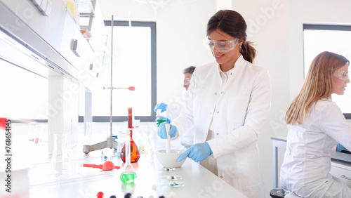 Woman working in a lab as a part of the research team