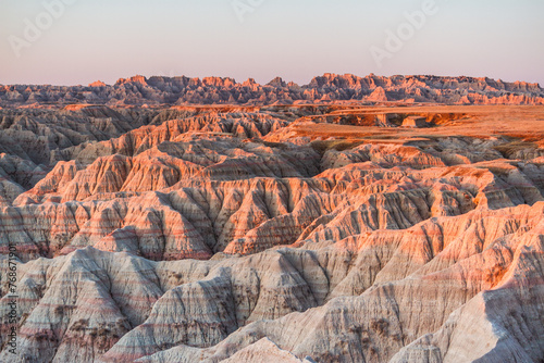 Photography The beautiful Badlands National Park in South Dakota with sunset view in the bac