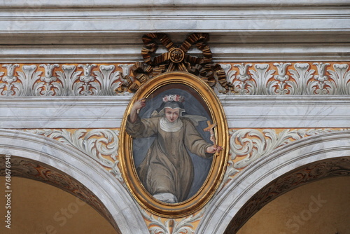 Santa Maria in Aracoeli Basilica Interior Detail with Painting of a Female Saint in an Oval Frame in Rome, Italy