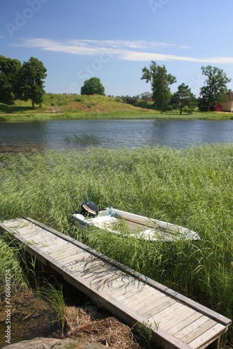 boat on the river. Vanern. Sweden photo