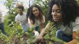 Tree care group of young people plant trees, help preserve the earth