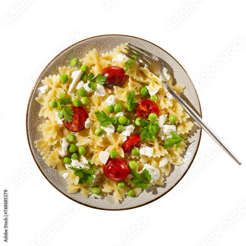 Farfalle pasta with  green peas, tomatoes and soft cheese on gray plate isolated on white background. Vegetarian food. Top view.