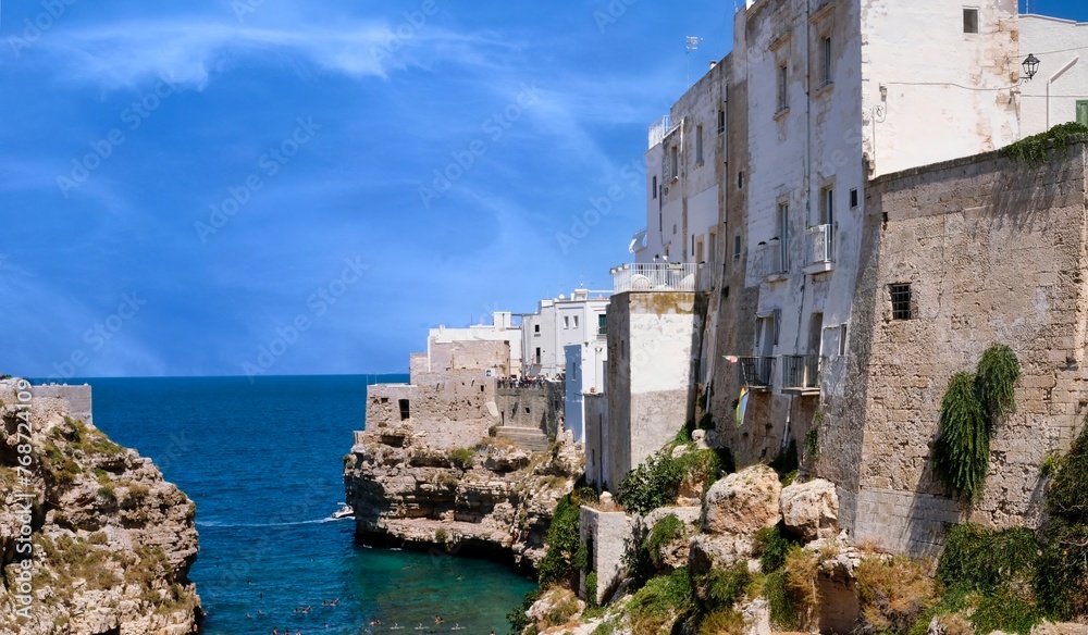 Polignano a Mare, the Pearl of the Adriatic, is a seaside village of rare beauty located in Puglia, Italy. Its charm comes from its crystal clear sea, cliffs, sea caves and a beautiful historic centre