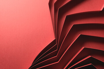 Abstract pattern made of paper, red background