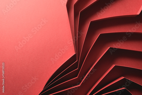 Abstract pattern made of paper, red background
