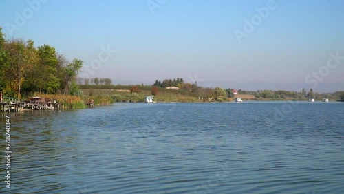 Idyllic footage of clean blue lake Borkovac in Serbia in summertime photo